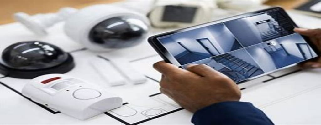 Image of Owner monitoring business security solutions